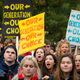 Demonstrators gather in Franklin Square in downtown Washington, Monday, Nov. 9, 2015, before marching to the White House. Expect more like them on July 21, 2018.